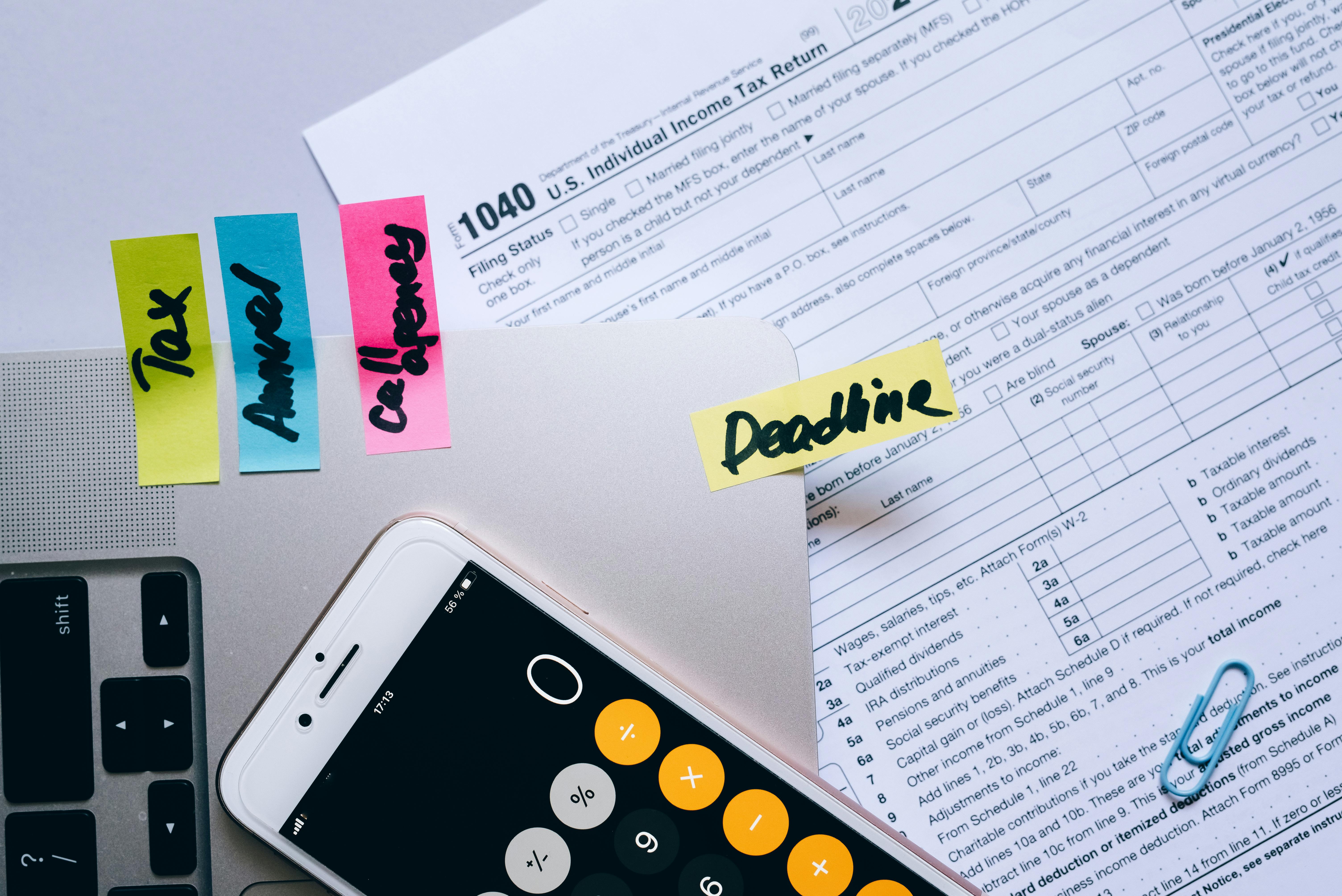 An illustration representing outsourcing statutory compliance. A professional reviews legal documents with a checklist, scales of justice, and a calendar in the background. This symbolizes external management of regulatory requirements, deadlines, and legal adherence for businesses.